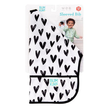 Load image into Gallery viewer, Bumkins Sleeved Bib: Hearts is shown folded in its packaging.