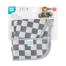 Load image into Gallery viewer, Bumkins Sleeved Bib: Charcoal Check is shown folded in its packaging.