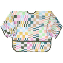 Load image into Gallery viewer, Bumkins Sleeved Bib: Motley Check features a colorful variegated checkered print on waterproof fabric, front pocket, and elastic cuffs.