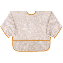 Load image into Gallery viewer, Bumkins Sleeved Bib: Wander is made of beige waterproof fabric with white abstract patterns, orange trim, front pocket, and elastic cuffs.