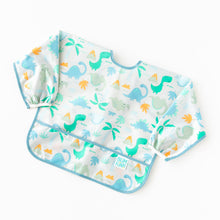 Load image into Gallery viewer, Bumkins Sleeved Bib: Dinosaurs rests on a white background.