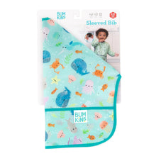 Load image into Gallery viewer, Bumkins Sleeved Bib: Ocean Life is shown folded in its packaging.