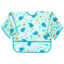 Load image into Gallery viewer, Bumkins Sleeved Bib: Ocean Life features colorful sea animals on light blue waterproof fabric, front pocket, and adjustable neck closure.