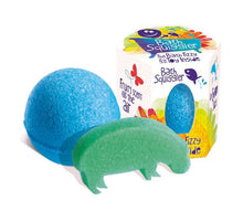 Load image into Gallery viewer, The Bath Squiggler Fizz & Toy by Loot Toys dissolves to reveal a green hippo, releasing a fruity fragrance into the air.