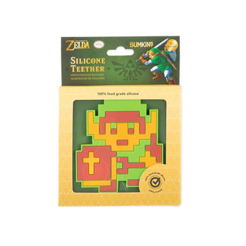 Bumkins Silicone Teether: Zelda™ Link is shown in a green and yellow packaging box with a clear front window displaying the teether.