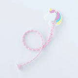 Bumkins Silicone Teether: Unicorn is attached to a pink silicone tether on a white background.