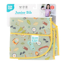 Load image into Gallery viewer, Bumkins Junior Bib: Camp Gear is shown folded on white cardboard packaging.