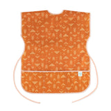 Bumkins Short-Sleeved Smock: Grounded features a white geometric pattern on orange waterproof fabric with an adjustable tie waist.