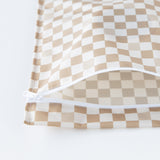 Close-up of Roamio by Bumkins Wet Bag: Sand Check, displayed open on a white background.