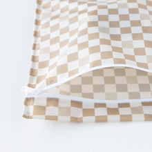 Load image into Gallery viewer, Close-up of Roamio by Bumkins Wet Bag: Sand Check, displayed open on a white background.