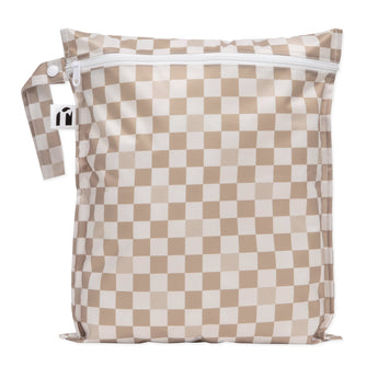 Roamio by Bumkins Wet Bag: Sand Check is a tan checkered waterproof bag with zipper closure and side handle.