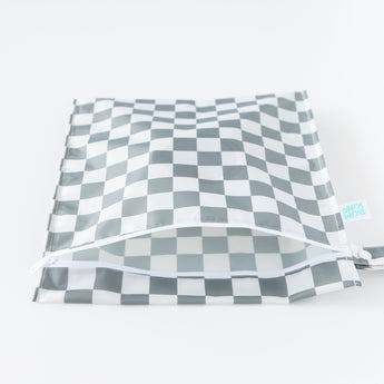 A partially open Bumkins Wet Bag: Charcoal Check lays on a white background.