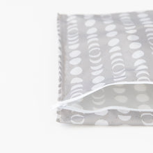 Load image into Gallery viewer, Close-up of Bumkins Wet Bag: Lunar Phase on a white background, partially open to reveal the interior.