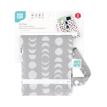 Load image into Gallery viewer, Bumkins Wet Bag: Lunar Phase is shown folded on white cardboard packaging.
