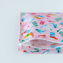 Load image into Gallery viewer, Roamio by Bumkins Wet Bag: Boots sits open on a white background, revealing the inside of the bag.