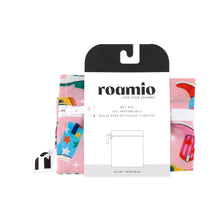 Load image into Gallery viewer, Roamio by Bumkins Wet Bag: Boots is shown folded in black & white cardboard packaging.
