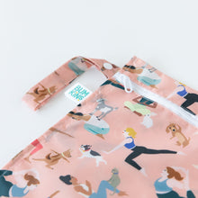 Load image into Gallery viewer, Close-up of Bumkins Wet Bag: Yoga Pals on a white background, with focus on the side handle, zipper, and logo label.