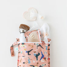 Load image into Gallery viewer, Bumkins Wet Bag: Yoga Pals holds a water bottle, breast pump parts, nursing pads & baby essentials on a white background.