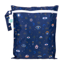 Load image into Gallery viewer, Bumkins Wet Bag: Evil Eye is made of blue waterproof fabric with a design of eyes, crescent moons, and zodiac symbols.
