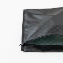 Load image into Gallery viewer, Roamio by Bumkins Wet Bag: Rich Black lays partially open on a white background, revealing the interior.