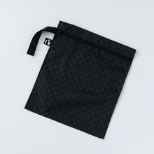 Load image into Gallery viewer, Roamio by Bumkins Wet Bag: Rich Black rests flat on a white background.