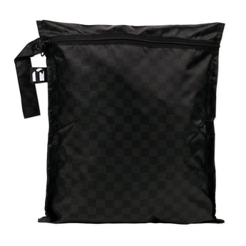 Roamio by Bumkins Wet Bag: Rich Black features a black waterproof checkered design, zipper closure, and side handle.
