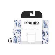 Load image into Gallery viewer, Roamio by Bumkins Wet Bag: Shells is shown folded in black & white cardboard packaging.
