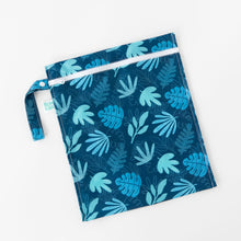 Load image into Gallery viewer, Bumkins Wet Bag: Blue Tropic lays flat on a white background.