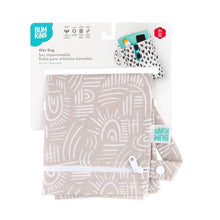 Load image into Gallery viewer, Bumkins Wet Bag: Wander is shown folded on white cardboard packaging.