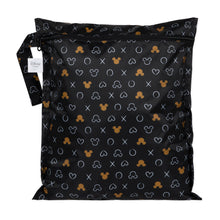 Load image into Gallery viewer, Bumkins Wet Bag: Minnie Mouse Icon Black + White is a black zippered waterproof pouch featuring Minnie Mouse silhouettes and white designs.