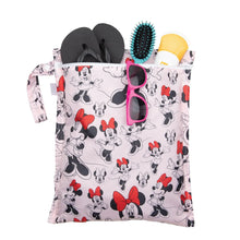 Load image into Gallery viewer, Bumkins Wet Bag: Minnie Mouse Classic holds sunglasses, sunscreen, sandals, and a hairbrush on a white background.