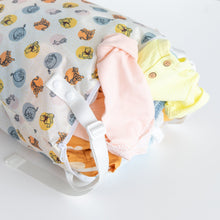 Load image into Gallery viewer, Bumkins Extra Large Wet Bag: Winnie + Friends with colorful baby clothes spilling out on a white background.
