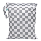 Bumkins Wet/Dry Bag: Charcoal Check is waterproof with two zippered compartments and a handle for odor-free storage of wet items.