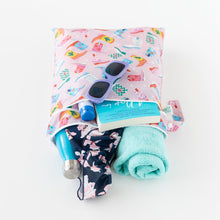 Load image into Gallery viewer, A towel, sunglasses, book, water bottle, and swimwear peek out from Bumkins Wet/Dry Bag: Boots on a white background.