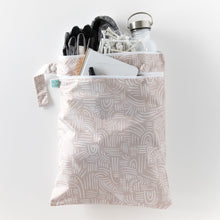 Load image into Gallery viewer, Bumkins Wet/Dry Bag: Wander holds a water bottle, gloves, a notebook, and black shoes on a white background.