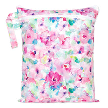 Load image into Gallery viewer, Bumkins Wet/Dry Bag: Watercolor features pink, blue, and green florals on waterproof fabric with a zipper and handle.