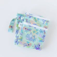 Load image into Gallery viewer, Bumkins Wet/Dry Bag: Aloha Stitch is folded on a white background.