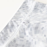 Close-up of Roamio by Bumkins Wet/Dry Clutch: Disco Check on a white background, with focus on the dual zipper.