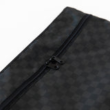 Close-up of Roamio by Bumkins Wet/Dry Clutch: Rich Black on a white background, made of waterproof fabric with zipper for versatile use.