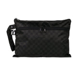 Roamio by Bumkins Wet/Dry Clutch: Rich Black features dual zippers, a handle strap, and black checkered waterproof fabric.