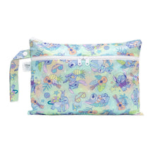Load image into Gallery viewer, Bumkins Wet/Dry Clutch: Aloha Stitch is a pastel multicolored waterproof pouch with a tropical motif and two zippered compartments.