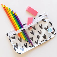 Load image into Gallery viewer, Colorful pencils and two pink erasers peek out from a Bumkins Clear Travel Bag 3-Pack: Hearts on a white background.