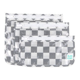 Bumkins Clear Travel Bag 3 Pack: Charcoal Check includes three TSA-compliant pouches with zippers and a clear front, ideal for travel.