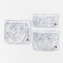 Load image into Gallery viewer, Roamio by Bumkins Clear Travel Bag 3 Pack: Disco Check is neatly arranged on a white background.