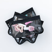 Load image into Gallery viewer, Bumkins Clear Travel Bag 3 Pack: Rich Black is shown stacked on a white background, holding scrunchies and nail polish.