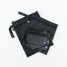 Load image into Gallery viewer, Bumkins Clear Travel Bag 3 Pack: Rich Black lie on top of other bags with a similar print on a white background.