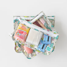 Load image into Gallery viewer, Bumkins Clear Travel Bag 3-Pack: Cacti lays stacked on a white background with toiletries & vitamin C packets inside.