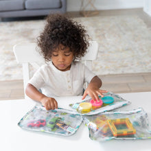 Load image into Gallery viewer, A child sits at a white table with toys in Bumkins Clear Travel Bag 3-Pack: Cacti.