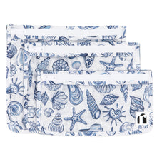 Load image into Gallery viewer, Roamio by Bumkins Clear Travel Bag 3 Pack: Shells includes 3 TSA-compliant bags made of white waterproof fabric with a blue shell pattern.