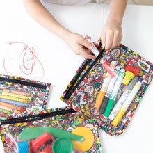 Load image into Gallery viewer, On a white table, a child organizes markers and art supplies into Bumkins Clear Travel Bag 3-Pack: Super Mario™ Mashup.